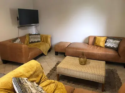 Coin salon dans l'établissement maison individuelle