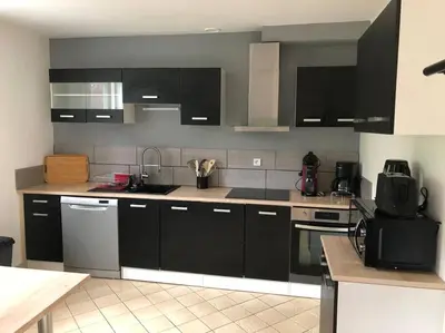 Cuisine ou kitchenette dans l'établissement maison individuelle