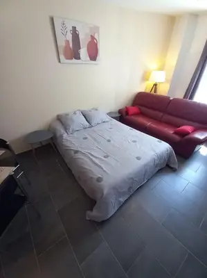 Un ou plusieurs lits dans un hébergement de l'établissement le cottage Arédien 1