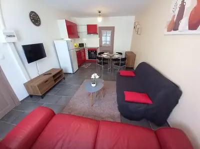 Cuisine ou kitchenette dans l'établissement le cottage Arédien 1