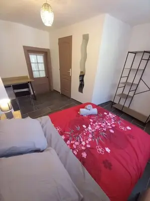 Un ou plusieurs lits dans un hébergement de l'établissement le cottage Arédien 1