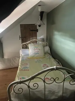 Un ou plusieurs lits dans un hébergement de l'établissement appartement de charme centre historique de Brive