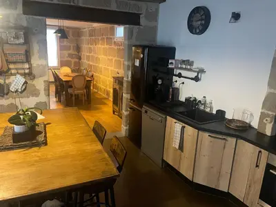 Cuisine ou kitchenette dans l'établissement appartement de charme centre historique de Brive