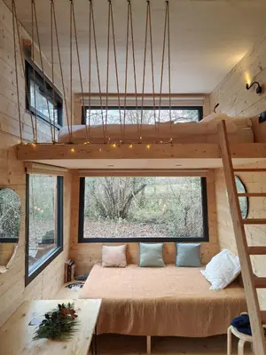Un ou plusieurs lits dans un hébergement de l'établissement Moose home Tiny house AMBUR
