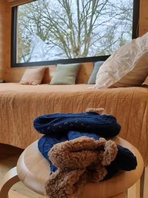 Un ou plusieurs lits dans un hébergement de l'établissement Moose home Tiny house AMBUR