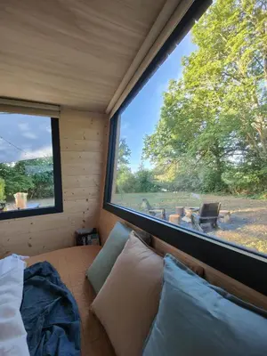 Coin salon dans l'établissement Moose home Tiny house AMBUR