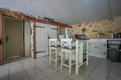 Cuisine ou kitchenette dans l'établissement Maison Les Chandelles