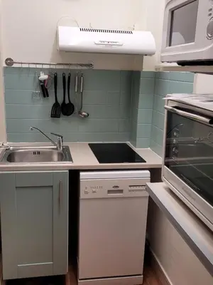Cuisine ou kitchenette dans l'établissement Le Sarciron