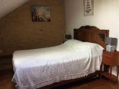 Un ou plusieurs lits dans un hébergement de l'établissement Au coeur du Périgord noir, gîte 6 pers, vue panoramique, proche Sarlat