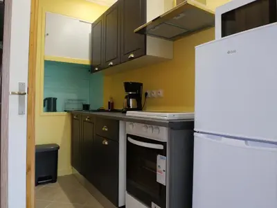 Cuisine ou kitchenette dans l'établissement Studio Ventadour