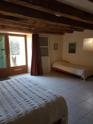 Un ou plusieurs lits dans un hébergement de l'établissement Gite de France Rosalie