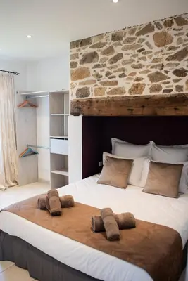 Un ou plusieurs lits dans un hébergement de l'établissement La Forge Maison de 110m2 en Limousin