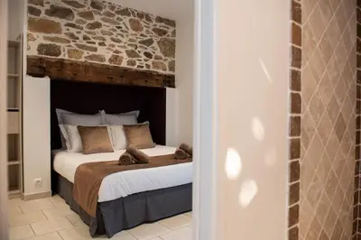 Un ou plusieurs lits dans un hébergement de l'établissement La Forge Maison de 110m2 en Limousin