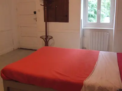 Un ou plusieurs lits dans un hébergement de l'établissement studio au calme