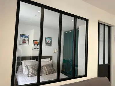 Un ou plusieurs lits dans un hébergement de l'établissement Appartement Les Amethystes 2