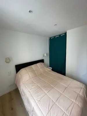 Un ou plusieurs lits dans un hébergement de l'établissement Appartement Les Amethystes 2