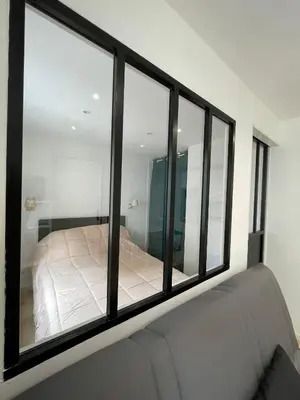 Un ou plusieurs lits dans un hébergement de l'établissement Appartement Les Amethystes 2