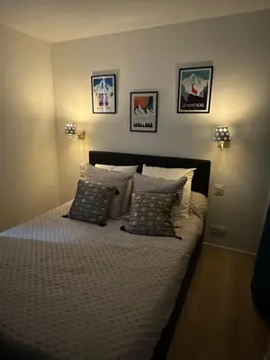 Un ou plusieurs lits dans un hébergement de l'établissement Appartement Les Amethystes 2