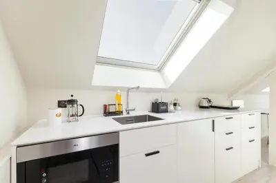 Cuisine ou kitchenette dans l'établissement Hôtel Gambettes - Entrée autonome, réception en ligne - Encore Mieux