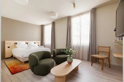 Un ou plusieurs lits dans un hébergement de l'établissement Hôtel Gambettes - Entrée autonome, réception en ligne - Encore Mieux