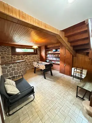 Coin salon dans l'établissement Villa Janchrisma MontDore 11pers