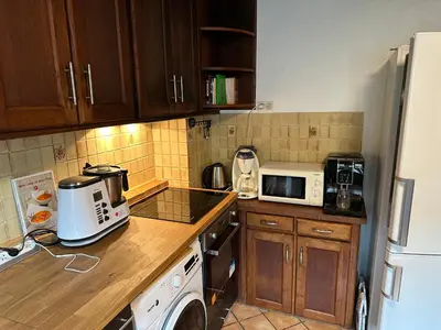 Cuisine ou kitchenette dans l'établissement Villa Janchrisma MontDore 11pers
