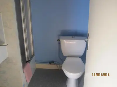 Salle de bains dans l'établissement Hotel Le Commerce