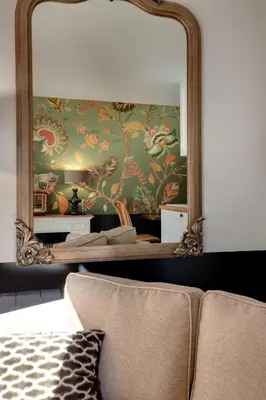 Coin salon dans l'établissement Le Boudoir Monsieur Aurélien - Suite Hôtelière