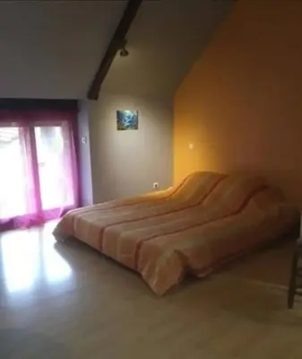 Un ou plusieurs lits dans un hébergement de l'établissement Chambre chez l'habitant