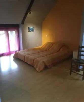 Un ou plusieurs lits dans un hébergement de l'établissement Chambre chez l'habitant