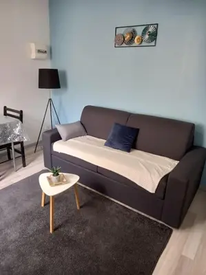 Coin salon dans l'établissement Résidence de l'évèché 7