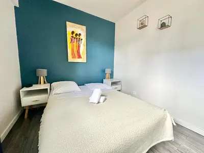 Un ou plusieurs lits dans un hébergement de l'établissement Le Péri T2 entièrement rénové avec balcon