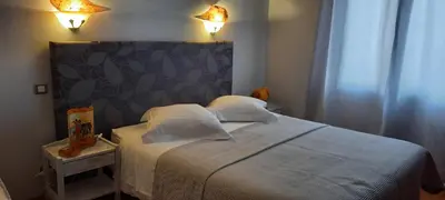 Un ou plusieurs lits dans un hébergement de l'établissement Chambres d'hôtes Chez Dumitra
