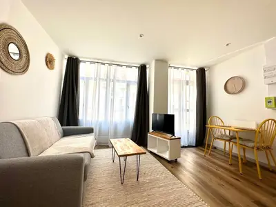 Coin salon dans l'établissement Bel appartement en plein centre ville