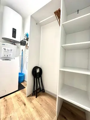 Cuisine ou kitchenette dans l'établissement Bel appartement en plein centre ville