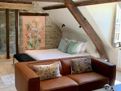 Coin salon dans l'établissement Château de la Borde à Ussel, centre-ville, proche autoroute A89
