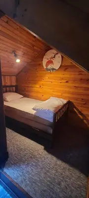 Un ou plusieurs lits dans un hébergement de l'établissement Maisonnette Lac de Vassivière