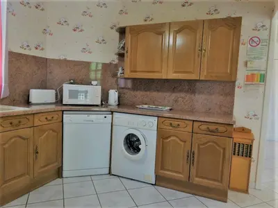 Cuisine ou kitchenette dans l'établissement Gite les Acacias - lesgitesdeshautsdevialot en perigord