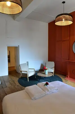 Un ou plusieurs lits dans un hébergement de l'établissement Les Chambres du Cloître