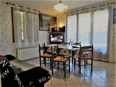 Coin salon dans l'établissement Gite les Pins - lesgitesdeshautsdevialot en perigord