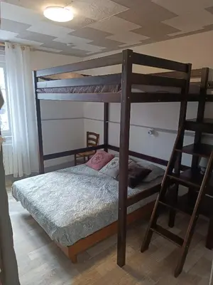 Un ou plusieurs lits dans un hébergement de l'établissement le Mont dore Centre ville appartement