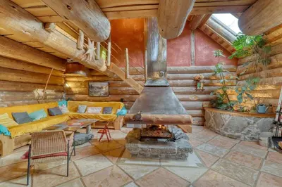 Coin salon dans l'établissement Chalet au bord d'un étang privé, Massif du Sancy