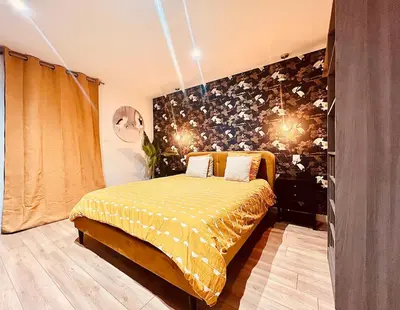 Un ou plusieurs lits dans un hébergement de l'établissement Le SPA de l’Impasse