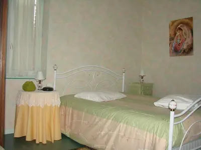 Un ou plusieurs lits dans un hébergement de l'établissement GITE DE CHOUVERT VERDIER Marie