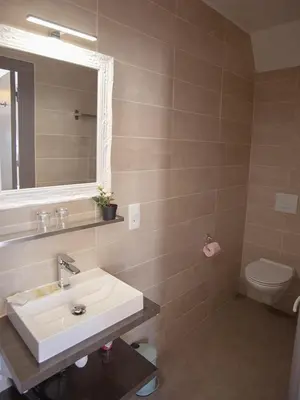 Salle de bains dans l'établissement Chambres & Tables d'hôtes Le Pech Grand