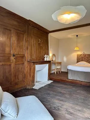 Un ou plusieurs lits dans un hébergement de l'établissement Le Château de Saint-Angel, Le Manoir du Rigouneix, 5 minutes A89, nature, calme, sauna