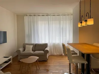 Coin salon dans l'établissement Appartement Suzon en coeur de ville 2 personnes