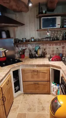 Cuisine ou kitchenette dans l'établissement un petit coin paisible