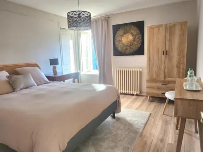 Un ou plusieurs lits dans un hébergement de l'établissement La Longère du cheval noir chambre d'hôtes référence et table d'hôtes, en pleine nature, proche d'une cité médièvale, parking couvert securisé