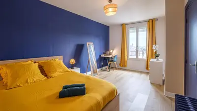 Coin salon dans l'établissement Bleu Nuit - Welc'Home